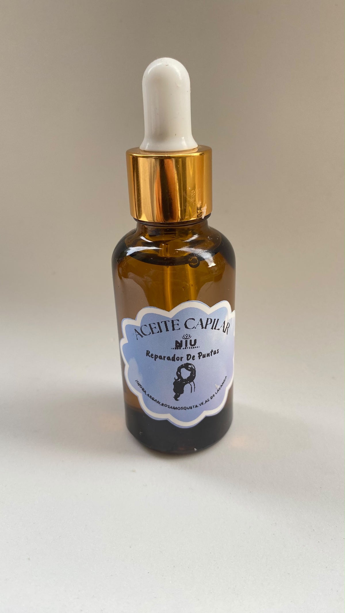 Sérum capilar reparador de puntas quebradizas